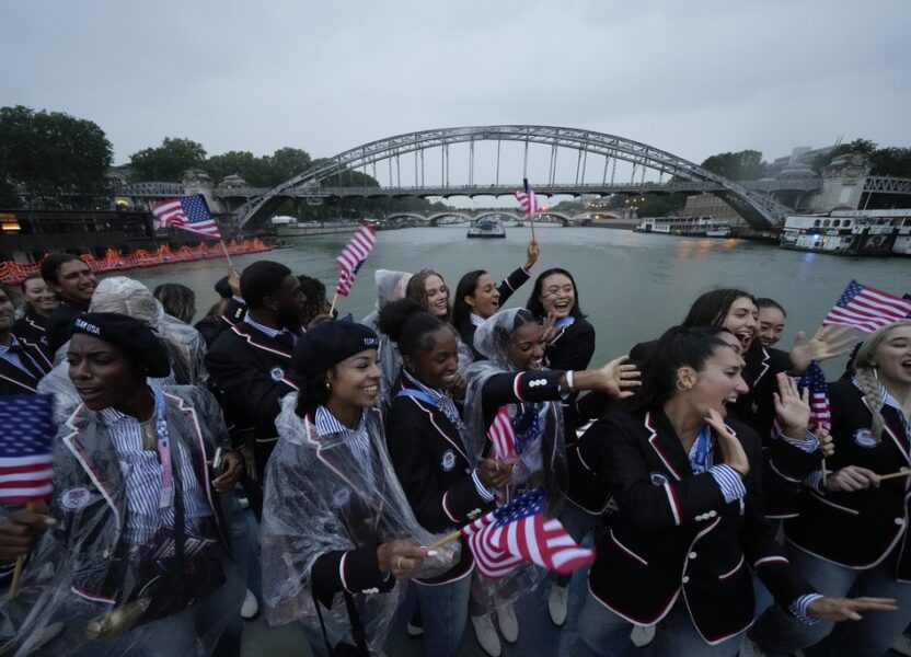 Paris glitters in the rain for ambitious Olympic opening ceremony The