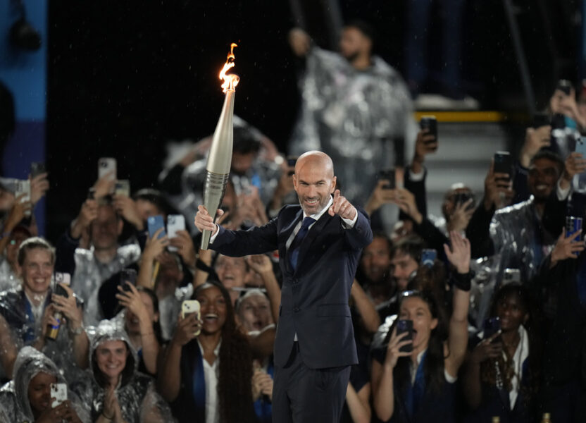 Paris glitters in the rain for ambitious Olympic opening ceremony The