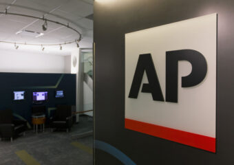 Earnings Associated Press