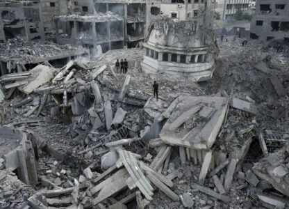 FILE - Palestinians inspect the rubble of the Yassin Mosque destroyed after it was hit by an Israeli airstrike at Shati refugee camp in Gaza City, early Monday, Oct. 9, 2023. Israel's military battled to drive Hamas fighters out of southern towns and seal its borders Monday as it pounded the Gaza Strip. (AP Photo/Adel Hana, File)