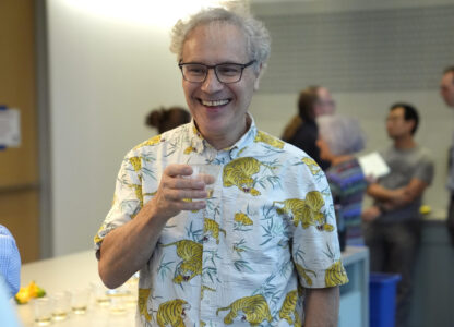 Victor Ambros, 2024 Nobel Prize winner in physiology or medicine, and professor of natural science at the University of Massachusetts Medical School, celebrates with colleagues, at the school, in Worcester, Mass. Monday, Oct. 7, 2024. (AP Photo/Steven Senne)