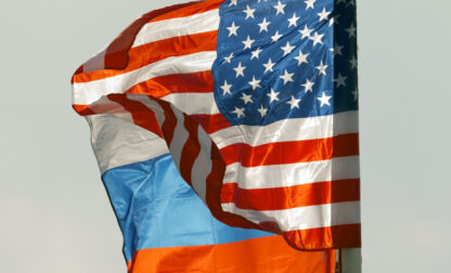 FILE - U.S. and Russian national flags wave on the wind in Moscow's Vnukovo airport, Russia, April 11, 2017 to welcome a U.S. dignitary. (AP Photo/ Ivan Sekretarev, file)