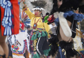 A dancer performs on Indigenous Peoples Day Monday, Oct. 14, 2024, in San Francisco. (AP Photo/Minh Connors)