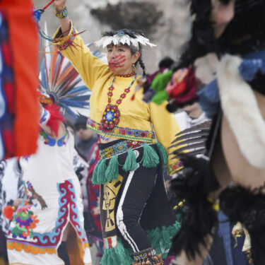 A dancer performs on Indigenous Peoples Day Monday, Oct. 14, 2024, in San Francisco. (AP Photo/Minh Connors)