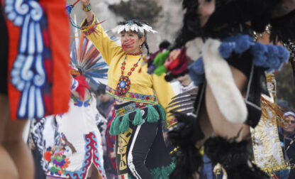 A dancer performs on Indigenous Peoples Day Monday, Oct. 14, 2024, in San Francisco. (AP Photo/Minh Connors)