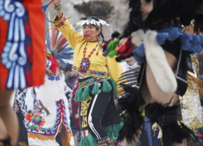 A dancer performs on Indigenous Peoples Day Monday, Oct. 14, 2024, in San Francisco. (AP Photo/Minh Connors)