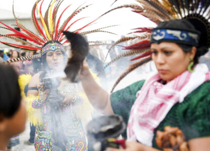 A performer burns charcoal during a ritual on Indigenous Peoples Day Monday, Oct. 14, 2024, in San Francisco. (AP Photo/Minh Connors)