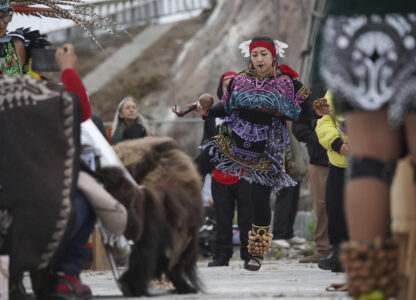 A dancer performs at the Indigenous Peoples Day Sunrise Gathering on Monday, Oct. 14, 2024, in San Francisco. (AP Photo/Minh Connors)