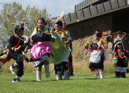 FILE - Hopi children dance in front of City Hall on Indigenous Peoples Day in Flagstaff, Ariz., Oct. 10, 2022. (AP Photo/Felicia Fonseca, File)