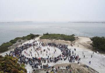 Hundreds attend the Indigenous People Day Sunrise Gathering on Monday, Oct. 14, 2024, in San Francisco. (AP Photo/Minh Connors)