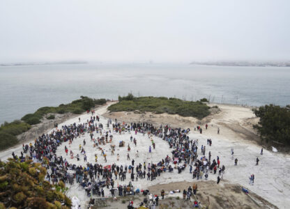 Hundreds attend the Indigenous People Day Sunrise Gathering on Monday, Oct. 14, 2024, in San Francisco. (AP Photo/Minh Connors)