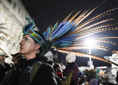 Leticia Bustos-Castaño dons a copilli on Monday, Oct. 14, 2024, in San Francisco. (AP Photo/Minh Connors)