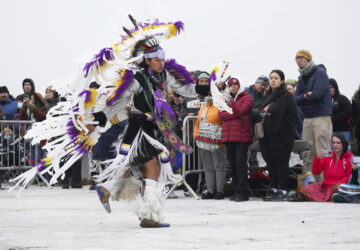 Tank Young, 14, performs at the Indigenous Peoples Day Sunrise Gathering on Monday, Oct. 14, 2024, in San Francisco. (AP Photo/Minh Connors)