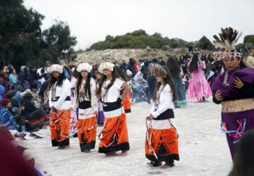 Dancers perform during the 2024 Indigenous Peoples Day Alacatraz Sunrise gathering on Monday, Oct. 14, 2024, in San Francisco. (AP Photo/Minh Connors)