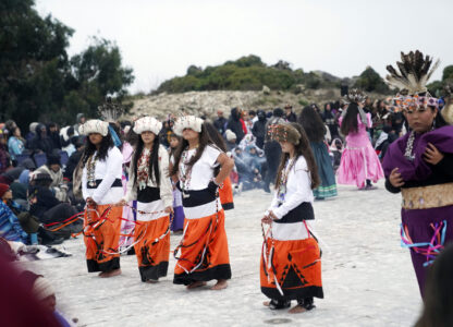 Dancers perform during the 2024 Indigenous Peoples Day Alacatraz Sunrise gathering on Monday, Oct. 14, 2024, in San Francisco. (AP Photo/Minh Connors)