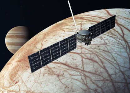 This illustration provided by NASA depicts the Europa Clipper spacecraft over the moon, Europa, with Jupiter at background left. (NASA/JPL-Caltech via AP)