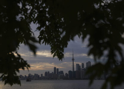 The Toronto skyline is seen from Wards Island in Toronto on Thursday, Sept. 19, 2024. (AP Photo/Angie Wang)