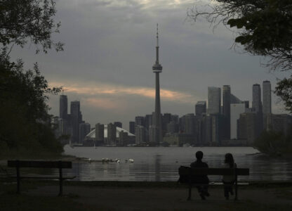 The Toronto skyline is seen from Wards Island in Toronto on Thursday, Sept. 19, 2024. (AP Photo/Angie Wang)