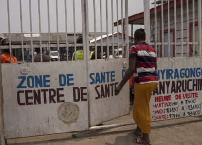 Eveline, 22 , walks to a health center seeking mental counselling in Goma, Democratic republic of the Congo, Monday, Aug. 26, 2024. (AP Photo/Moses Sawasawa)