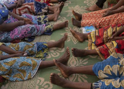 Nelly Shukuru, 51, and others receive counseling in Goma, Democratic Republic of the Congo, Tuesday, Aug. 27, 2024. (AP Photo/Moses Sawasawa)