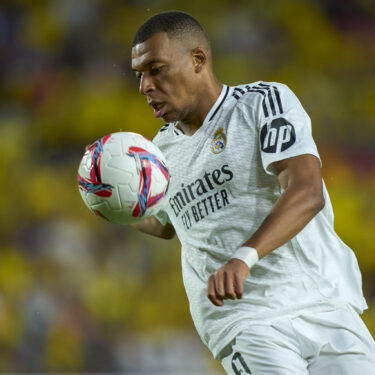 FILE - Real Madrid's Kylian Mbappe tries to control the ball during the Spanish La Liga soccer match between Las Palmas and Real Madrid at the Gran Canaria stadium in Las Palmas, Spain's Canary Islands, Thursday, Aug. 29, 2024. (AP Photo/Gabriel Jimenez, File)