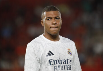 FILE - Real Madrid's Kylian Mbappe looks on before the start of a Spanish La Liga soccer match between Mallorca and Real Madrid at the Son Moix Stadium in Palma de Mallorca, Spain, Sunday, Aug. 18, 2024. (AP Photo/Francisco Ubilla, File)