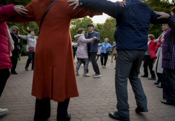 Retirees dance during a weekly event in a park in Chisinau, Moldova, Saturday, Oct. 19, 2024. (AP Photo/Vadim Ghirda)