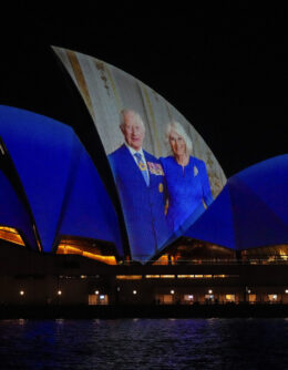 The Sydney Opera House sails show photos of Britain's King Charles and Queen camilla soon after their arrival in Sydney, Australia, Friday, Oct. 18, 2024. (AP Photo/Mark Baker)