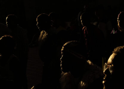 Pilgrims arrive inside San Felipe Church to honor the Black Christ in Portobelo, Panama, early Monday, Oct. 21, 2024, during a festival celebrating the iconic statue that was found on the shore in 1658. (AP Photo/Matias Delacroix)