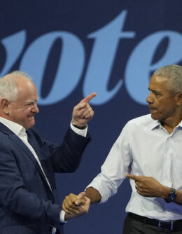 Democratic vice presidential nominee Minnesota Gov. Tim Walz, left, and former President Barack Obama shake hands at a campaign event Tuesday, Oct. 22, 2024, in Madison, Wis. (AP Photo/Morry Gash)