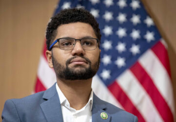 FILE - Rep. Maxwell Frost, D-Fla., listens during a panel discussion in Washington, Jan. 10, 2023. (AP Photo/Amanda Andrade-Rhoades, File)