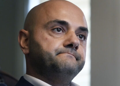 Assad Turfe, a Lebanese American and the deputy executive of Wayne County, recalls the detainment of his wife, during an interview, Oct. 23, 2024 in Dearborn, Mich. Turfe is among the few Arab American leaders in Michigan to have endorsed presidential candidate Kamala Harris. (AP Photo/Carlos Osorio)