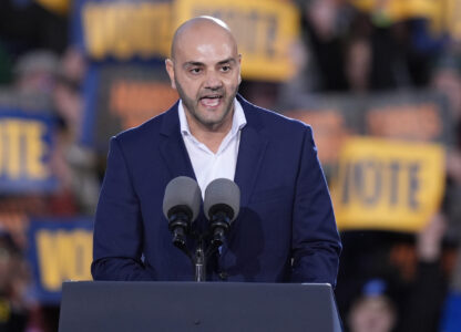 Assad Turfe, of Dearborn, Mich., speaks at a campaign rally for Democratic presidential nominee Vice President Kamala Harris at Burns Park in Ann Arbor, Mich., Monday, Oct. 28, 2024. (AP Photo/Carlos Osorio)