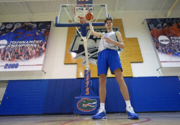 Olivier Rioux, 7-foot-4 NCAA college basketball player at Florida, poses for a photo after practice, Friday, Oct. 18, 2024, in Gainesville, Florida. (AP Photo/John Raoux)