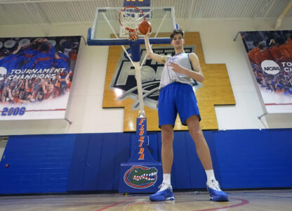 Olivier Rioux, 7-foot-4 NCAA college basketball player at Florida, poses for a photo after practice, Friday, Oct. 18, 2024, in Gainesville, Florida. (AP Photo/John Raoux)