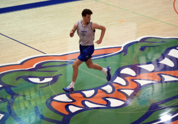 Olivier Rioux, 7-foot-4 NCAA college basketball player at Florida, leads the court during the team's practice, Friday, Oct. 18, 2024, in Gainesville, Florida. (AP Photo/John Raoux)