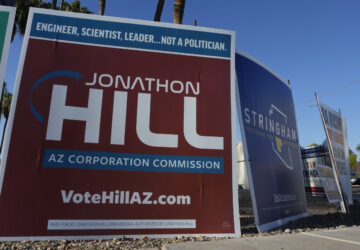 Some of the many political signs on display for the upcoming general election Thursday, Sept. 26, 2024, in Tempe, Ariz. (AP Photo/Ross D. Franklin)