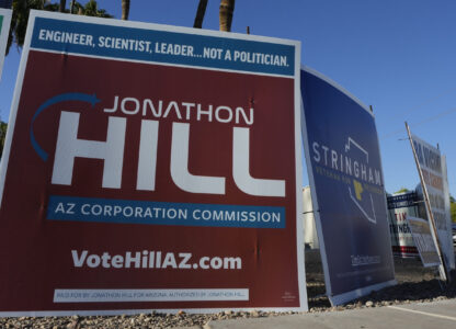 Some of the many political signs on display for the upcoming general election Thursday, Sept. 26, 2024, in Tempe, Ariz. (AP Photo/Ross D. Franklin)