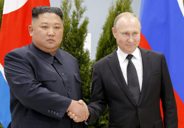 FILE - Russian President Vladimir Putin, right, and North Korea's leader Kim Jong Un shake hands during their meeting in Vladivostok, Russia, on April 25, 2019. (AP Photo/Alexander Zemlianichenko, Pool, File)