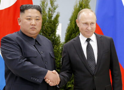 FILE - Russian President Vladimir Putin, right, and North Korea's leader Kim Jong Un shake hands during their meeting in Vladivostok, Russia, on April 25, 2019. (AP Photo/Alexander Zemlianichenko, Pool, File)