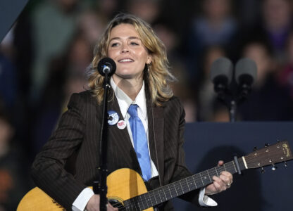 Maggie Rogers performs at a campaign event for Democratic presidential nominee Vice President Kamala Harris in Burns Park Monday, Oct. 28, 2024, in Ann Arbor, Mich. (AP Photo/Carlos Osorio)