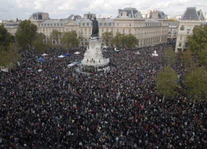 FILE - Hundreds of people gather on Republique square during a demonstration Sunday Oct. 18, 2020 in Paris, in support of freedom of speech and to pay tribute to French history teacher Samuel Paty. (AP Photo/Michel Euler, File)