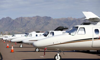 FILE - Private jets sit parked at Scottsdale Airport on Jan. 27, 2015, in Scottsdale, Ariz. (AP Photo/Ross D. Franklin, File)