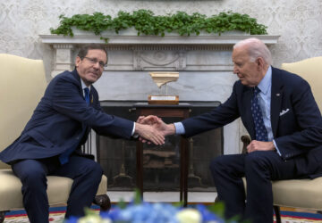 President Joe Biden shakes hands with Israel's President Isaac Herzog, left, during a meeting in the Oval Office of the White House in Washington, Tuesday, Nov. 12, 2024. (AP Photo/Ben Curtis)