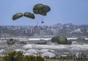 FILE - An aircraft airdrops humanitarian aid over Khan Younis, Gaza Strip, Thursday, May 30, 2024. (AP Photo/Abdel Kareem Hana, File)