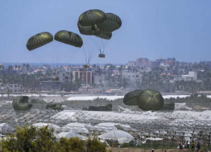 FILE - An aircraft airdrops humanitarian aid over Khan Younis, Gaza Strip, Thursday, May 30, 2024. (AP Photo/Abdel Kareem Hana, File)