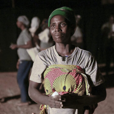 Fanta Charlotte Dabone, a mother of three who fled her village after it was attacked by extremists, participates in Recreatrales, an international theater festival held in Ouagadougou, Burkina Faso, Monday, Oct. 28, 2024. (AP Photo/Kilaye Bationo)