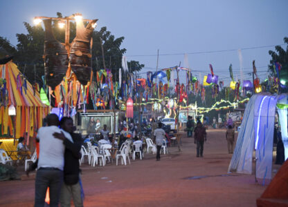 People gather for Recreatrales, an international theater festival held in Ouagadougou, Burkina Faso, Monday, Oct. 28, 2024. (AP Photo/Kilaye Bationo)