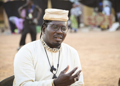 Aristide Tarnagda, the artistic director of Recreatrales, an international theater festival held in Ouagadougou, Burkina Faso, speaks to reporters Monday, Oct. 28, 2024. (AP Photo/Kilaye Bationo)