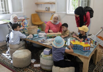 Palestinian children who were brought to Lebanon from the Gaza Strip for treatment, play at a summer camp in Beirut, Lebanon, Friday, Aug. 30, 2024. (AP Photo/Bilal Hussein)